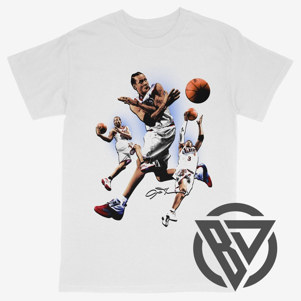 A white short-sleeve crewneck t-shirt featuring a graphic print of basketball player Allen Iverson in mid-air, wearing a white jersey and red-and-white sneakers, with an orange basketball. A dark gray circular logo with stylized letters 'BD' is printed on the bottom right.